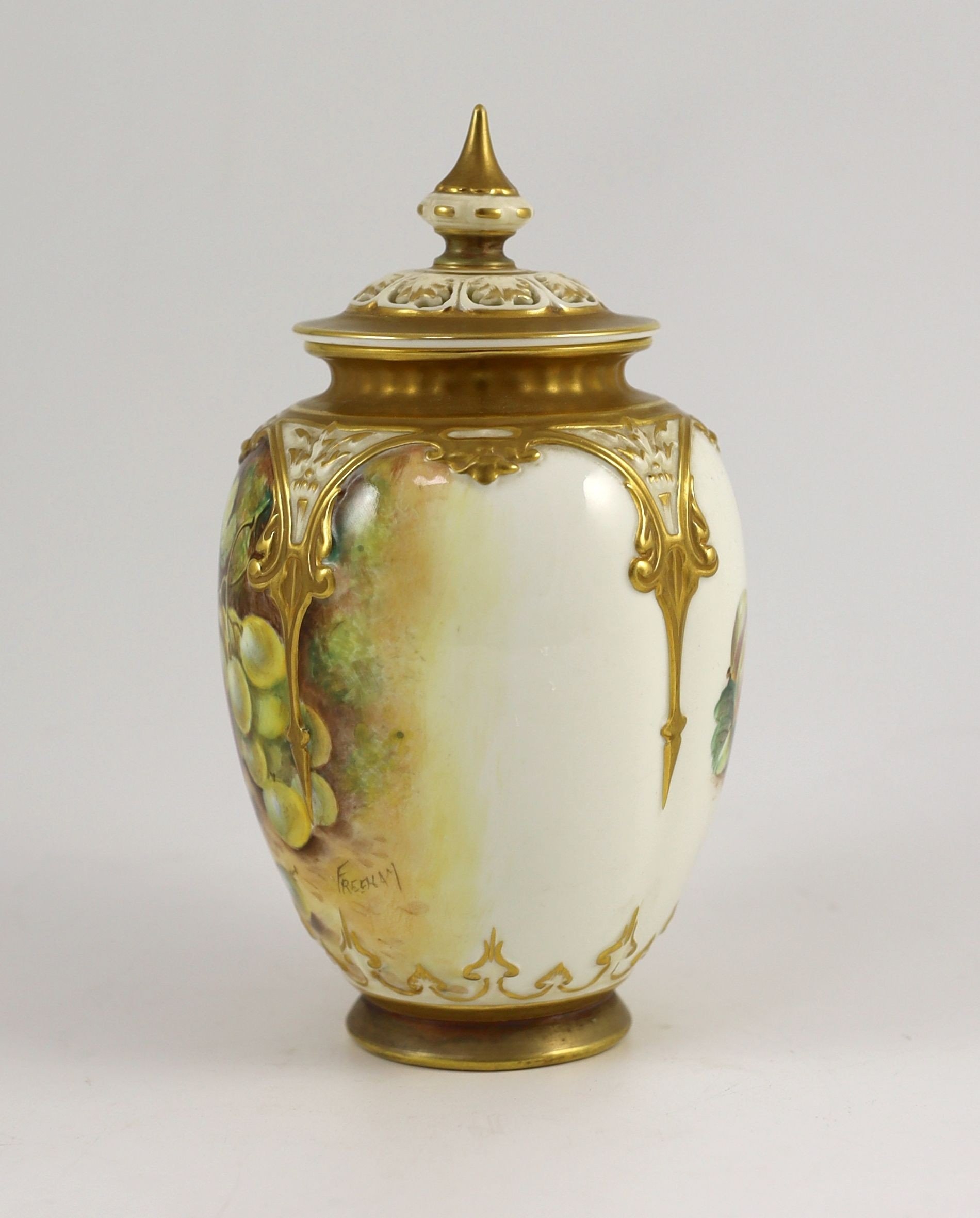 A Royal Worcester fruit painted vase and cover, by John Freeman, c.1962, 19cm high